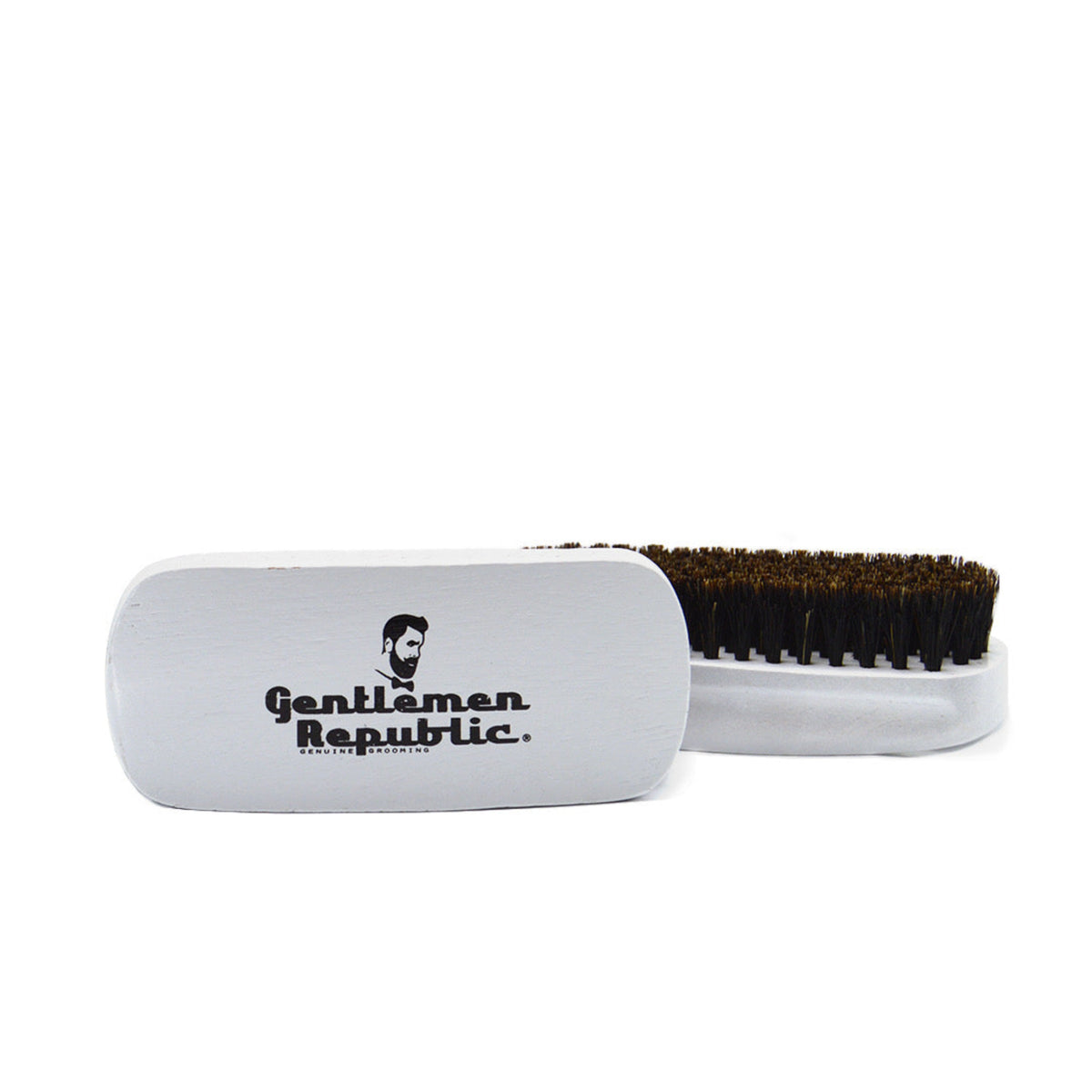 Beard brush with black bristles in a white case on a white background, featuring 'Gentleman Republic' branding.