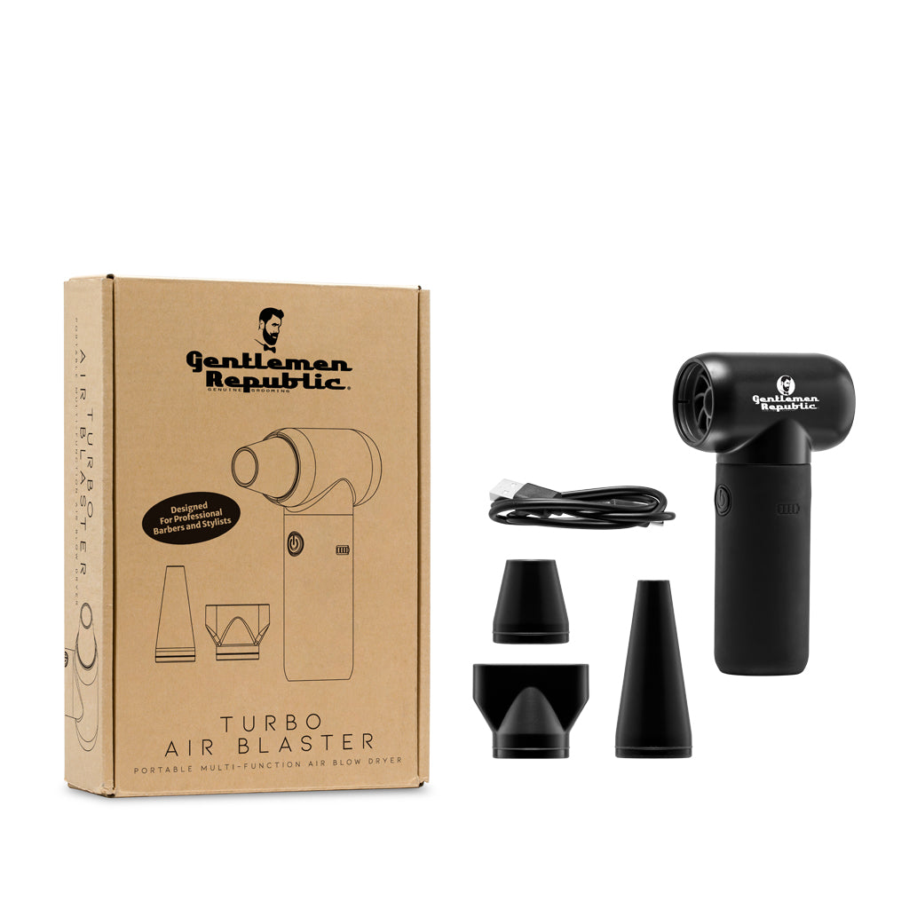 Product image of a black blow dryer with 4 different accessories: 3 nozzle options, a charging cable, and its package.