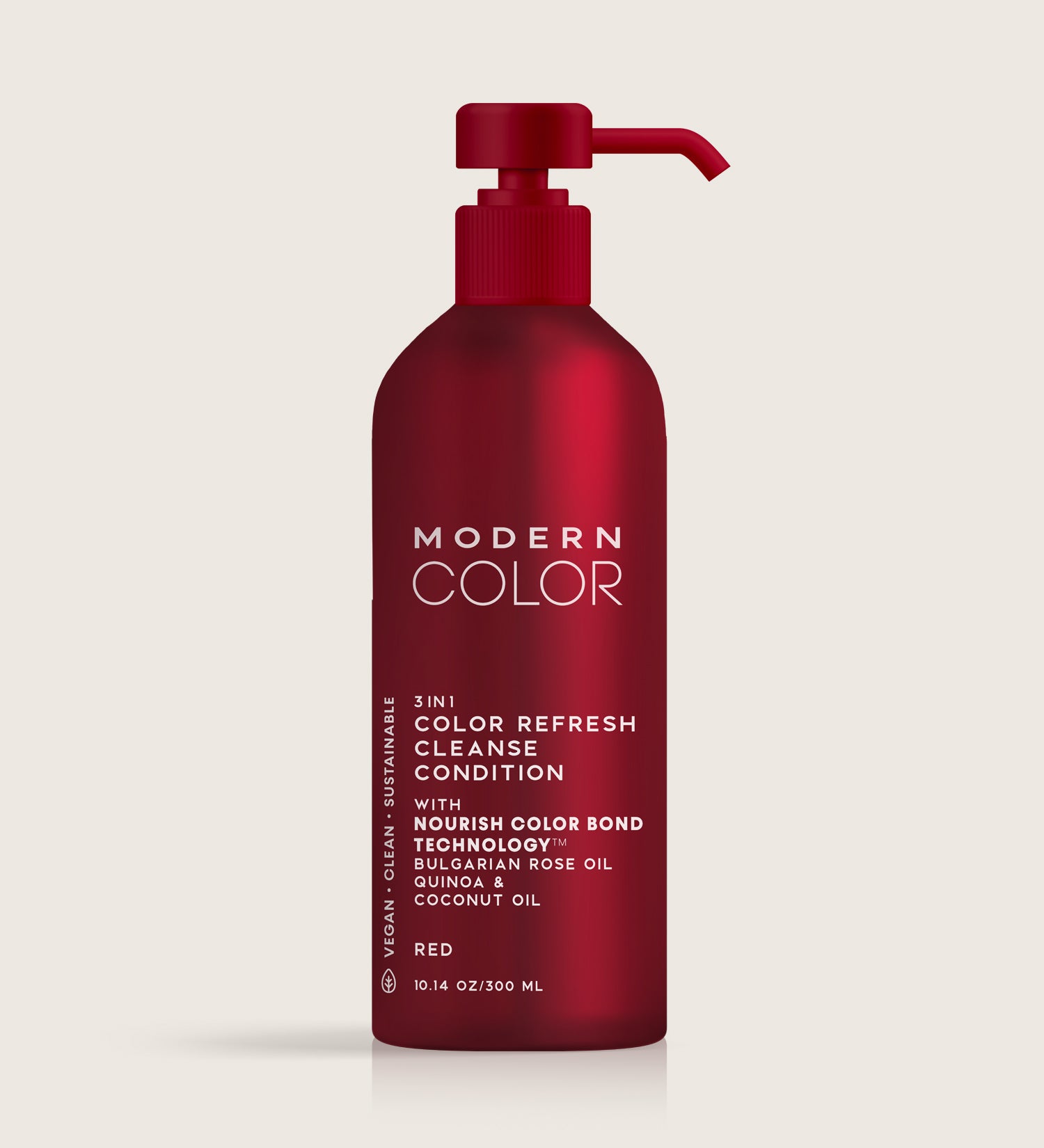 Product image of a red bottle labeled Modern Color 3-in-1 Color Refresh: Cleanse, Condition, and Nourish with Bulgarian Rose Oil, Quinoa, and Coconut Oil. Features Nourish Color Bond Technology for vibrant red hair.