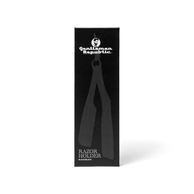 Black razor holder package featuring the Gentlemen Republic logo and a razor holder outline design.